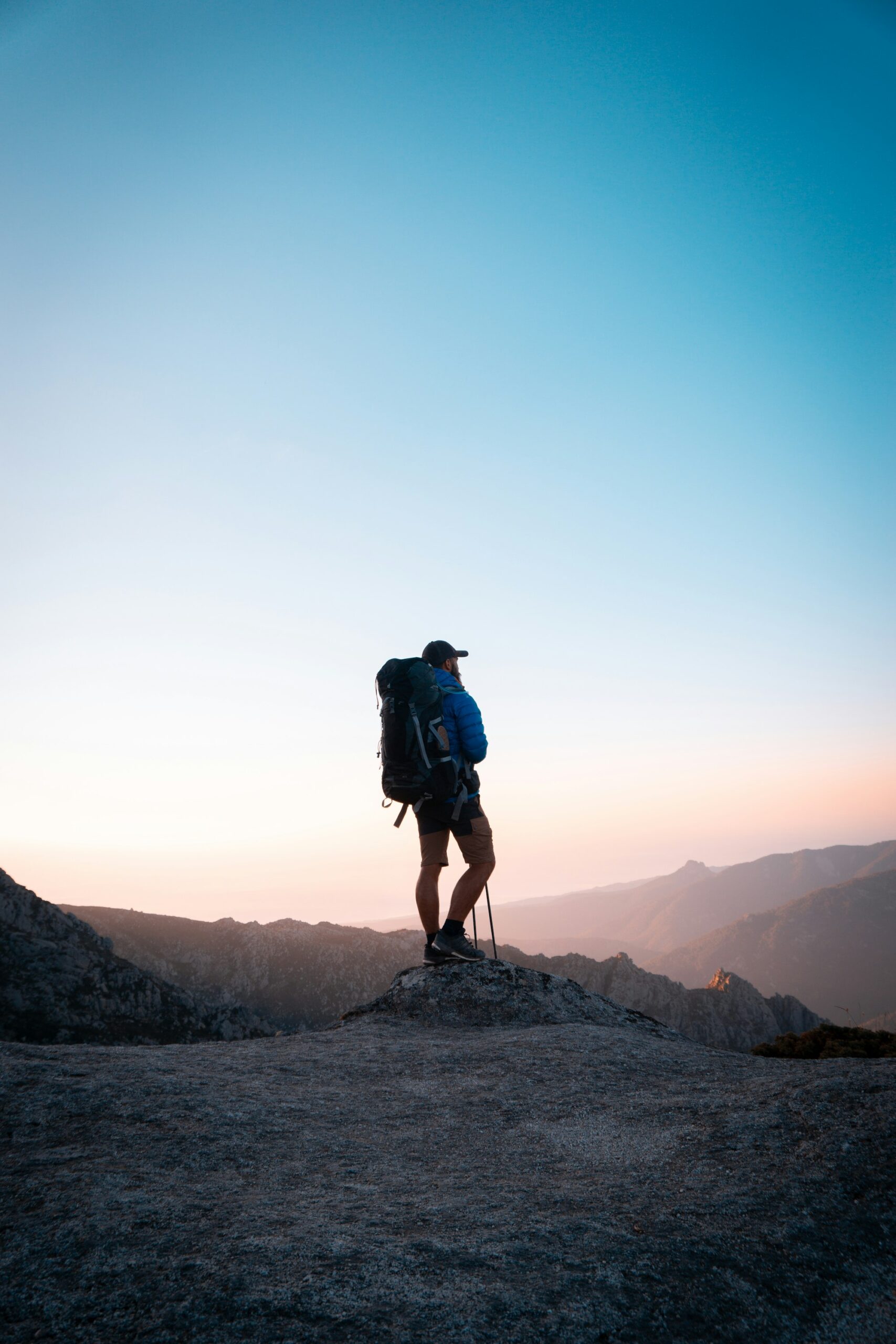 Hiker with a backpack, part of a layered packing list for northern Pakistan