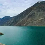 A large body of water surrounded by mountains in Skardu Valley, Pakistan