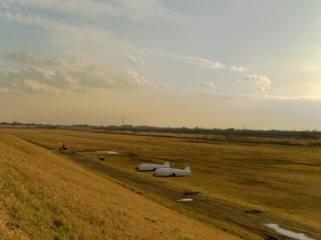 A small plane on a runway, similar to turboprops used on smaller domestic routes in Pakistan