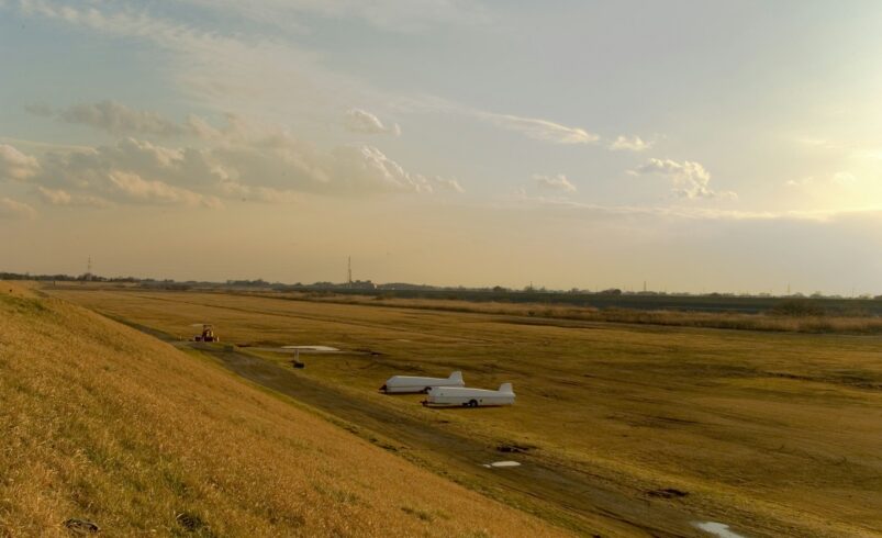 A small plane on a runway, similar to turboprops used on smaller domestic routes in Pakistan