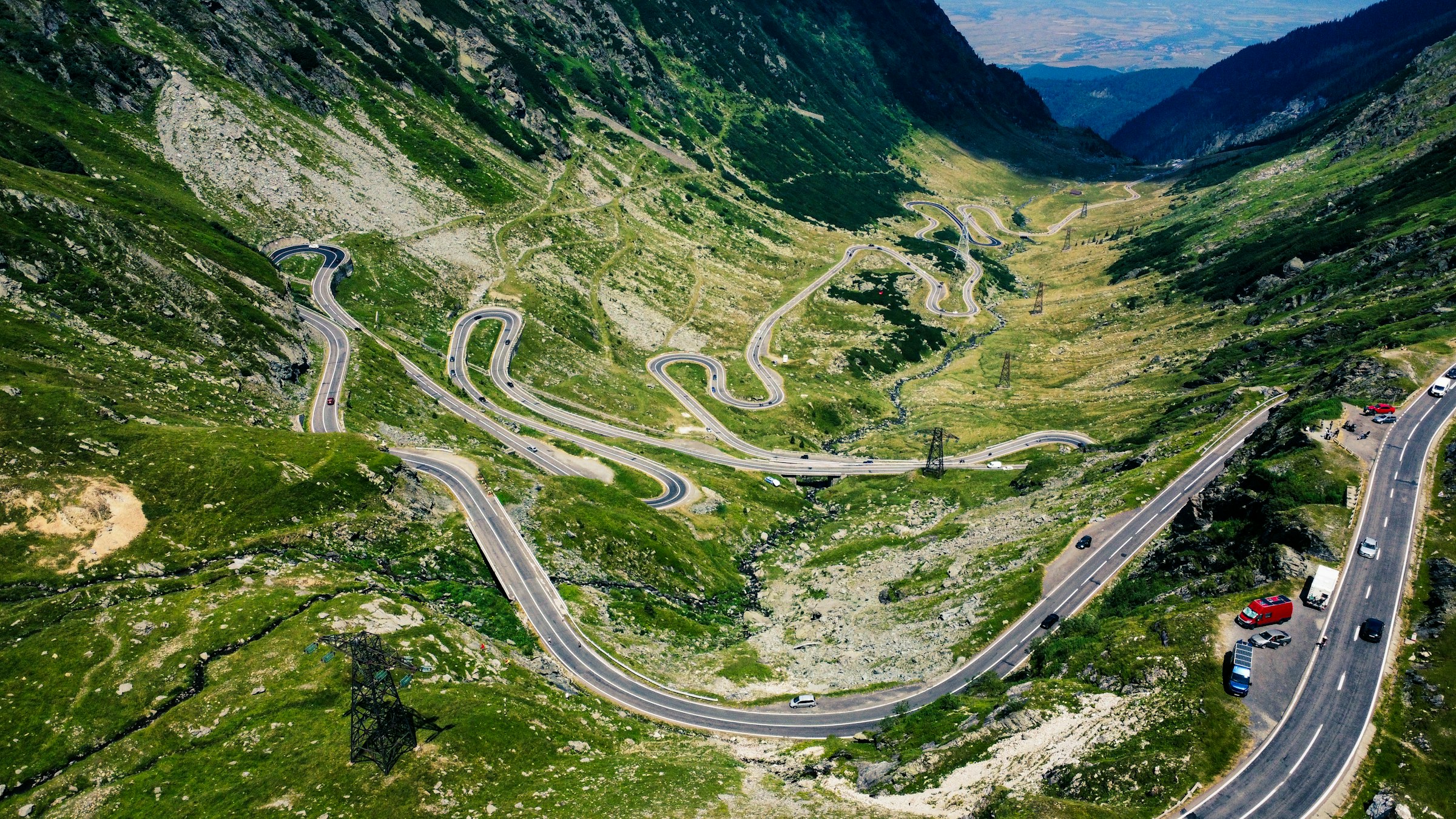 A winding mountain road seen from above, similar to sections of the Karakoram Highway