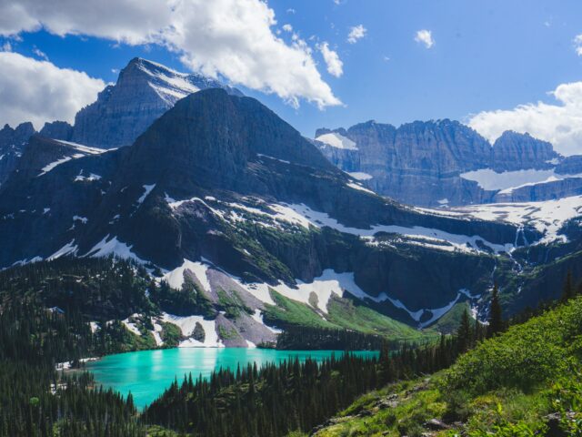A glacial lake with mountains in the background, similar to Batura Lake, Hunza, Pakistan