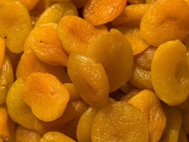 A pile of golden dried apricots, central to Hunza cuisine, Pakistan
