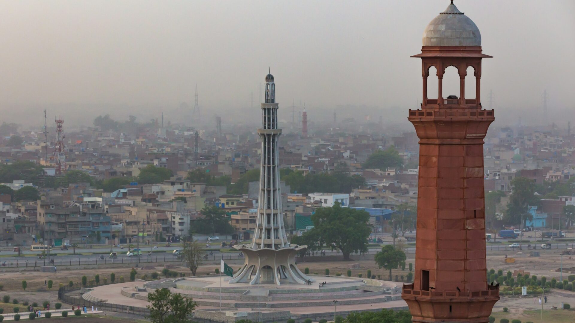 Minar-e-Pakistan and a Badshahi Mosque minaret seen from above in Lahore, Pakistan