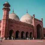 The Badshahi Mosque with red sandstone walls in Lahore, Punjab, Pakistan