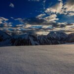 Trekkers near the snow-covered Gondogoro La pass in the Karakoram, Gilgit-Baltistan