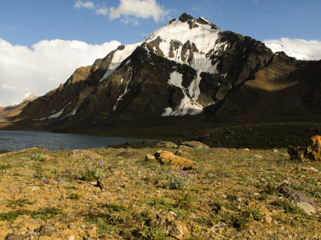 Karambar Lake, a high-altitude glacial lake near the Broghil Valley and Ishkoman divide, with surrounding mountain slopes