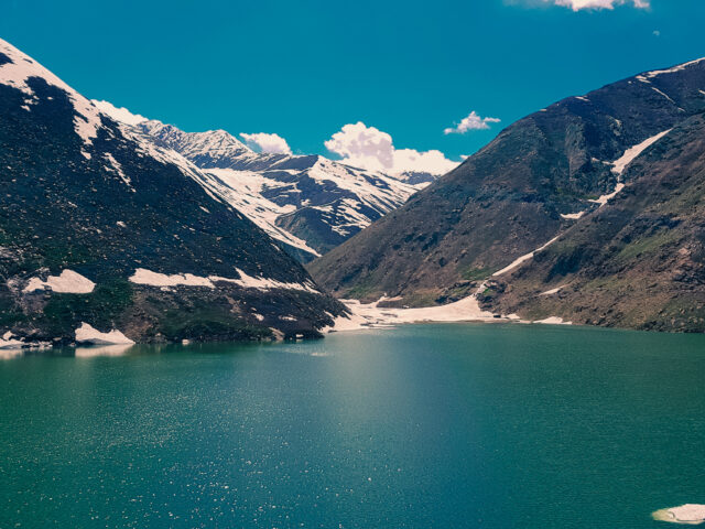 Lulusar Lake in the Kaghan Valley with open mountain slopes around the water
