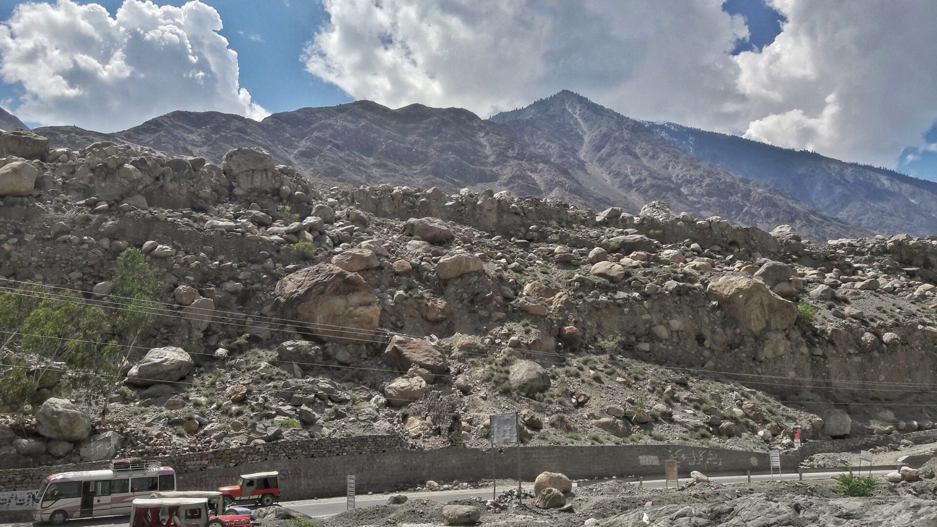 Jeeps parked at Raikot Bridge on the Karakoram Highway, where the Fairy Meadows track begins